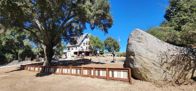 a view of a chairs and tables in the patio