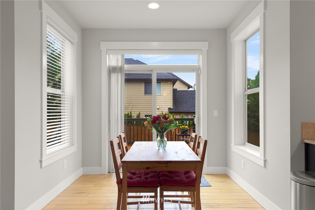 1017 Chelan Place Northeast Renton, WA 98059 - Photo 19 of 40 a dining room with furniture and window