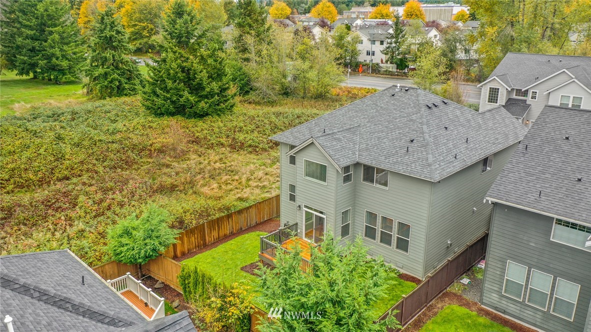 1017 Chelan Place Northeast Renton, WA 98059 - Photo 3 of 40 an aerial view of a house with a yard