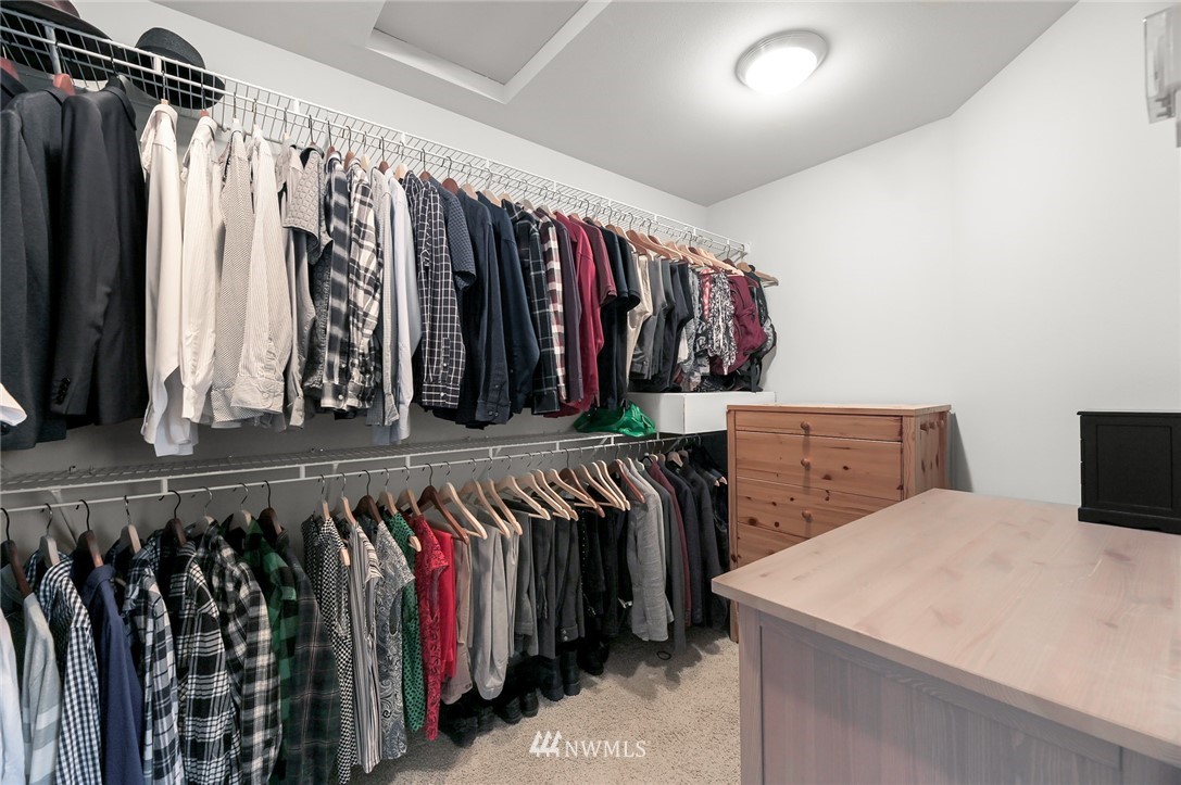 1017 Chelan Place Northeast Renton, WA 98059 - Photo 32 of 40 a view of walk in closet with clothes