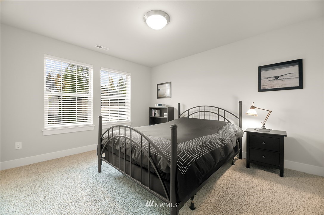 1017 Chelan Place Northeast Renton, WA 98059 - Photo 33 of 40 a bedroom with a bed and window