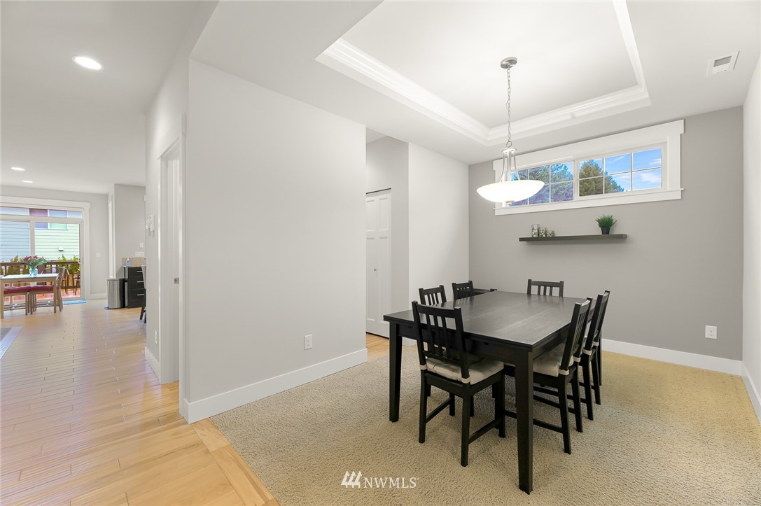1017 Chelan Place Northeast Renton, WA 98059 - Photo 5 of 40 a view of a dining room with furniture