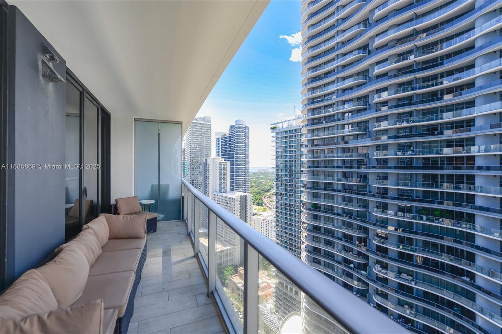 1010 Brickell Avenue, Unit 3608 Miami, FL 33131 - Photo 3 of 48 a view of a balcony with furniture