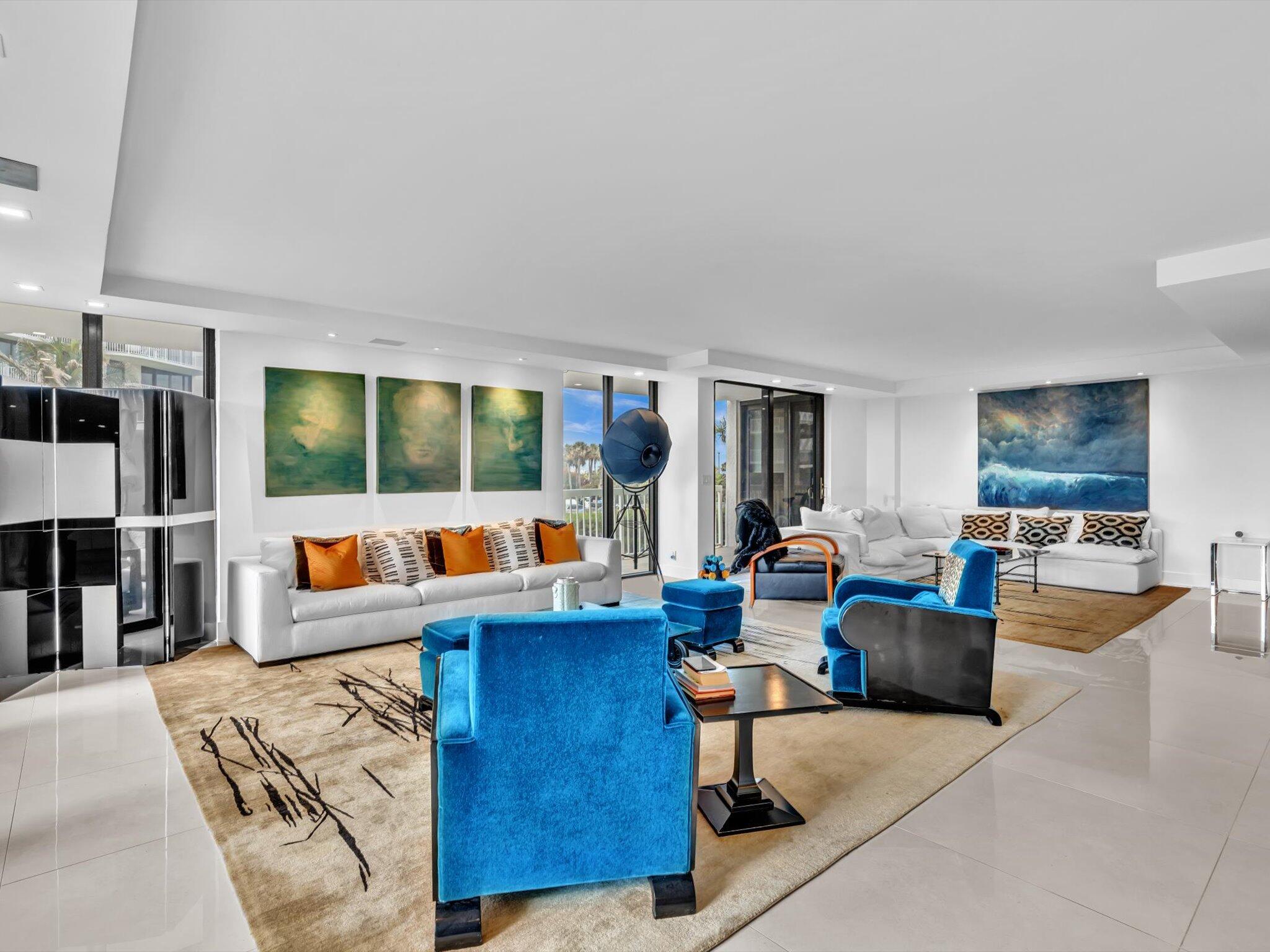 3300 South Ocean Boulevard, Unit 108S Palm Beach, FL 33480 - Photo 15 of 66 a living room with furniture and a flat screen tv