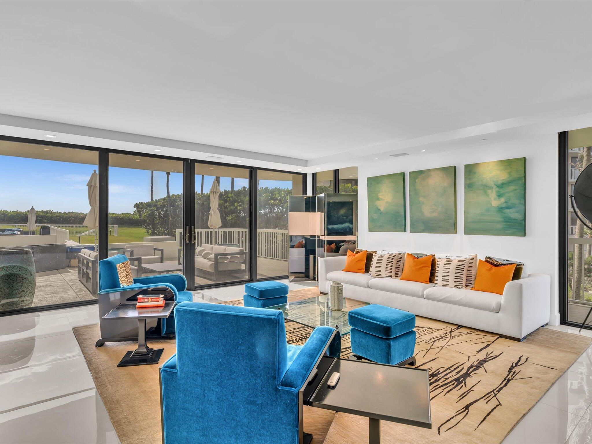 3300 South Ocean Boulevard, Unit 108S Palm Beach, FL 33480 - Photo 20 of 66 a living room with furniture and a large window