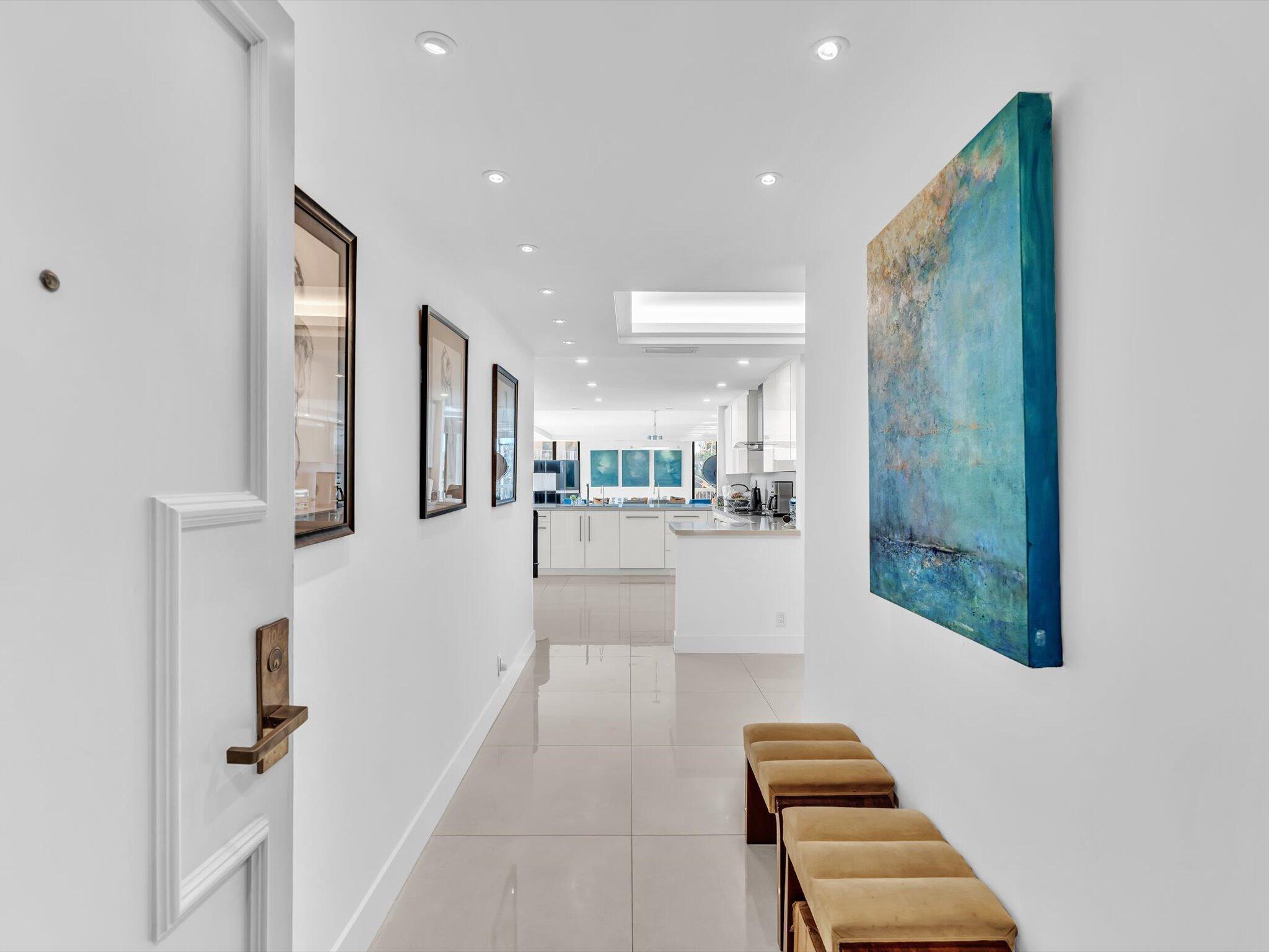 3300 South Ocean Boulevard, Unit 108S Palm Beach, FL 33480 - Photo 2 of 66 a view of a hallway with seating area