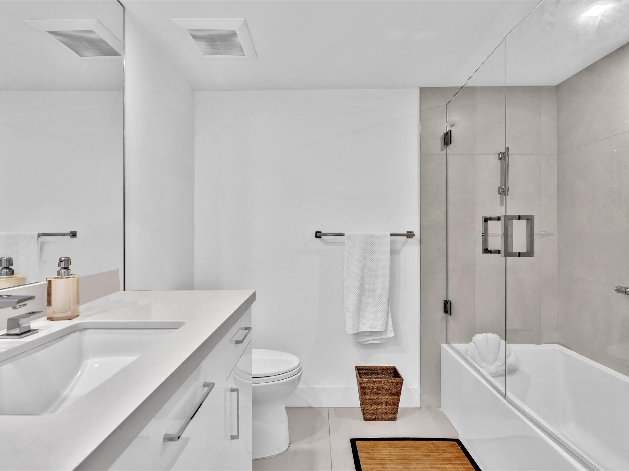 3300 South Ocean Boulevard, Unit 108S Palm Beach, FL 33480 - Photo 24 of 66 a bathroom with a sink a toilet and shower