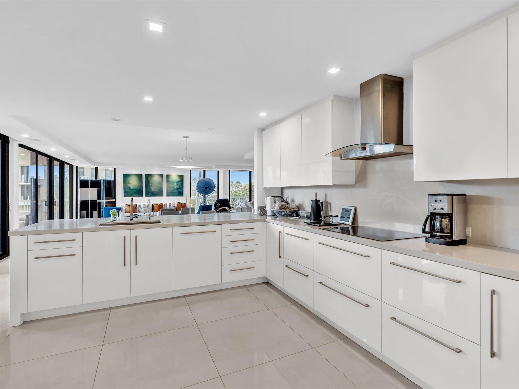 3300 South Ocean Boulevard, Unit 108S Palm Beach, FL 33480 - Photo 3 of 66 a kitchen with cabinets and sink
