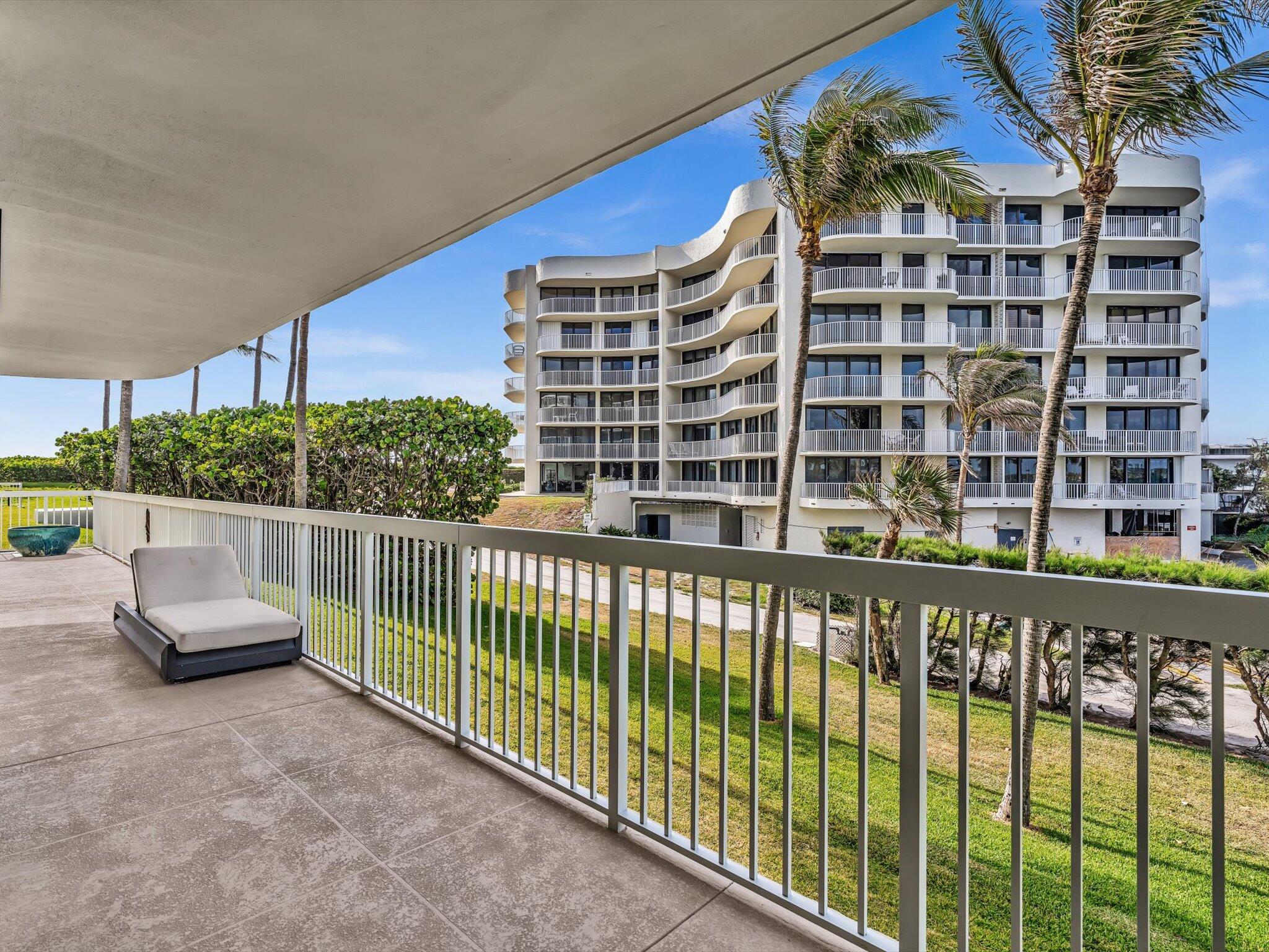 3300 South Ocean Boulevard, Unit 108S Palm Beach, FL 33480 - Photo 40 of 66 a view of a building from a balcony