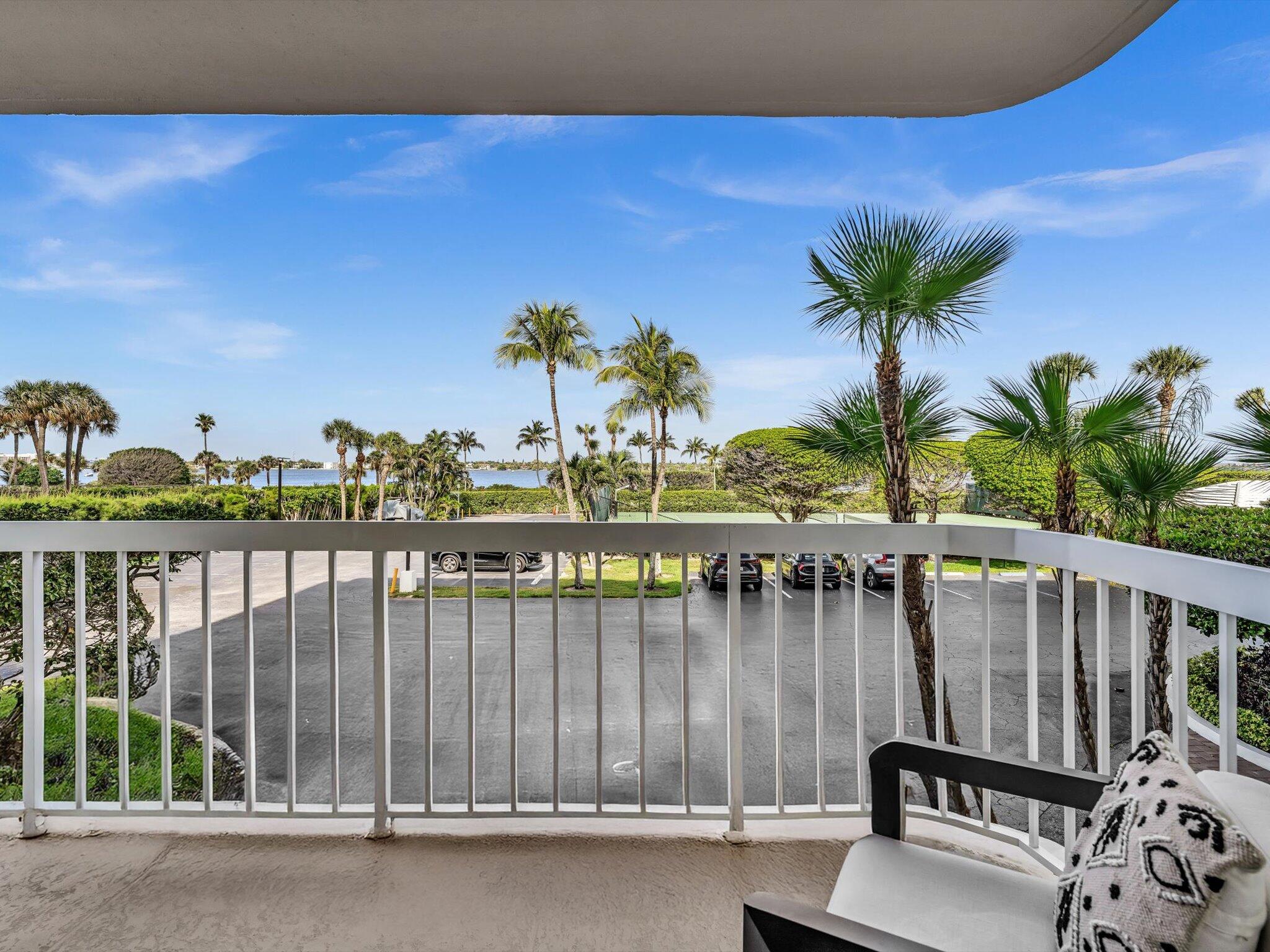 3300 South Ocean Boulevard, Unit 108S Palm Beach, FL 33480 - Photo 41 of 66 a view of a balcony with lake view and wooden floor