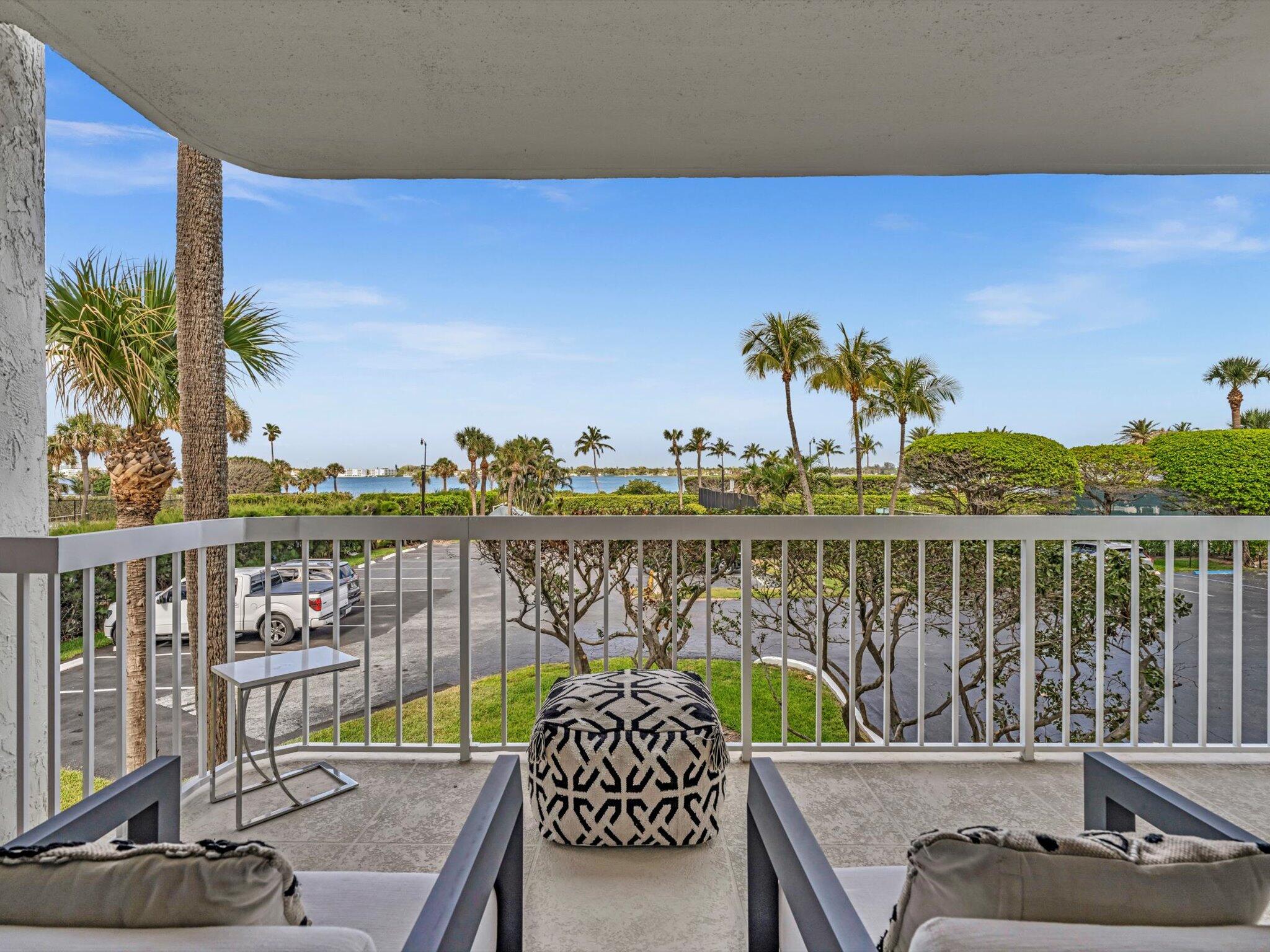 3300 South Ocean Boulevard, Unit 108S Palm Beach, FL 33480 - Photo 43 of 66 a balcony with furniture and a potted plant