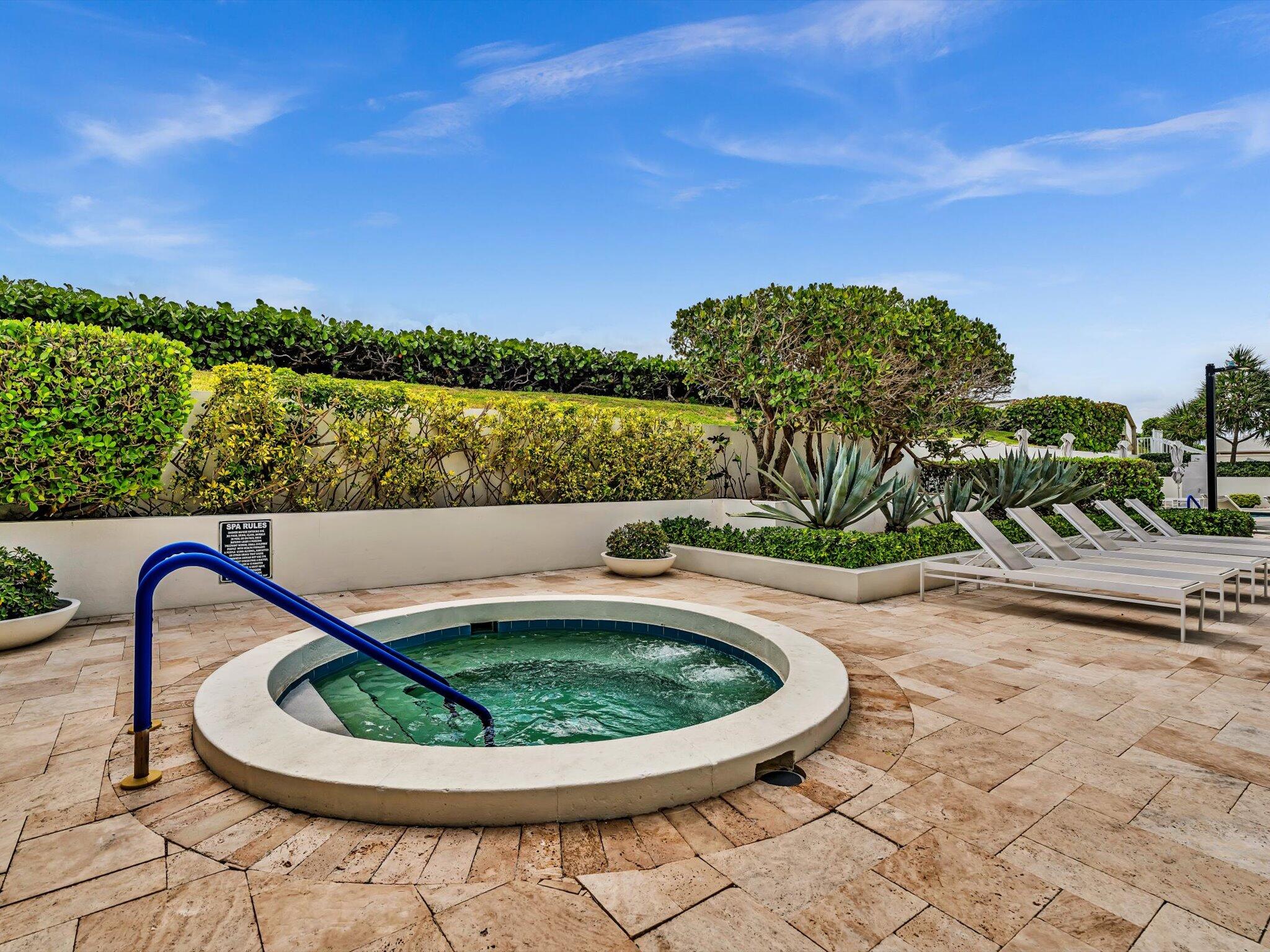 3300 South Ocean Boulevard, Unit 108S Palm Beach, FL 33480 - Photo 49 of 66 a view of a swimming pool with a outdoor seating