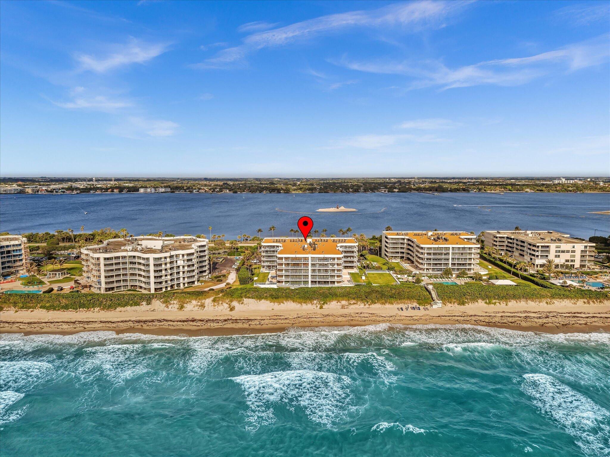 3300 South Ocean Boulevard, Unit 108S Palm Beach, FL 33480 - Photo 59 of 66 a view of a swimming pool with an outdoor space and seating area