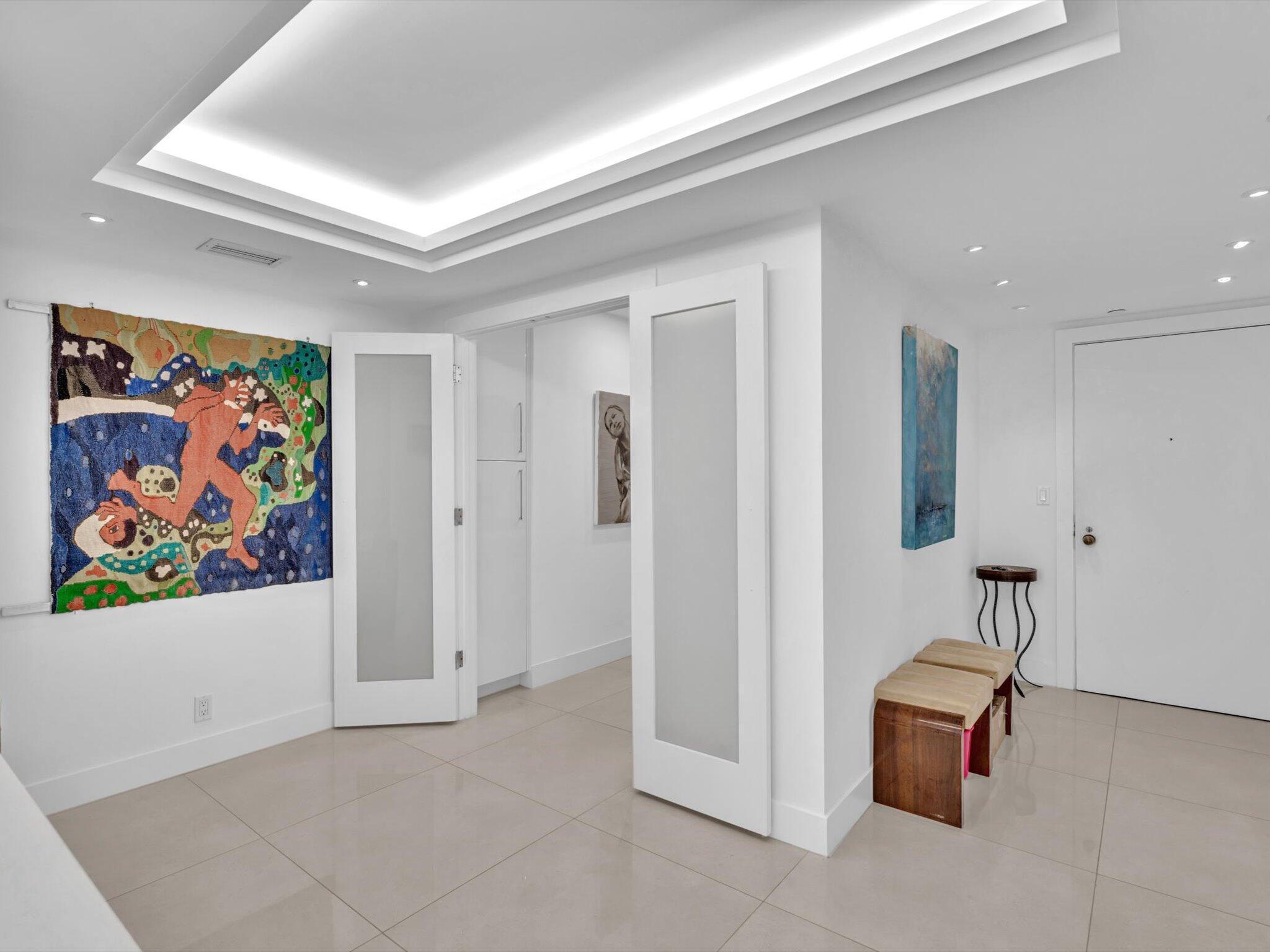 3300 South Ocean Boulevard, Unit 108S Palm Beach, FL 33480 - Photo 9 of 66 a view of a hallway with workspace