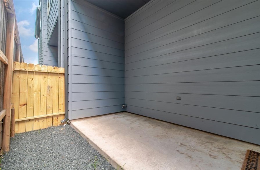 8907 Spring Knoll Forest Drive Houston, TX 77080 - Photo 19 of 21 a view of a wooden door