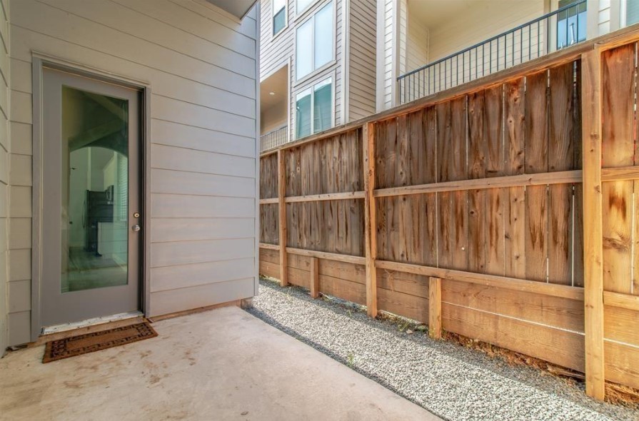 8907 Spring Knoll Forest Drive Houston, TX 77080 - Photo 20 of 21 a view of a backyard