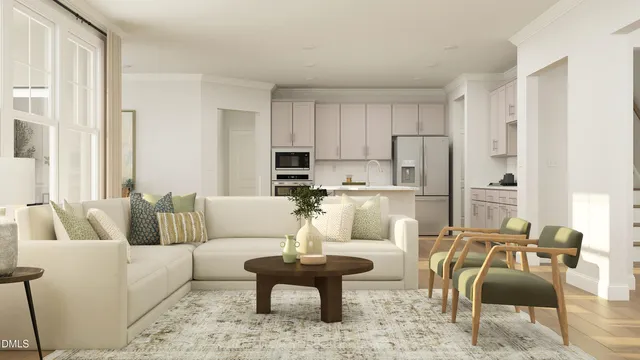a living room with furniture white walls and white appliances