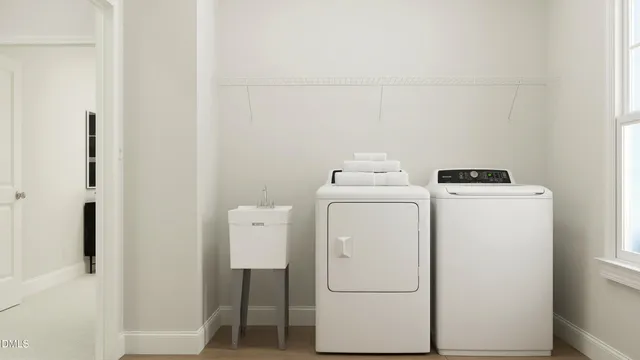 a utility room with dryer and washer