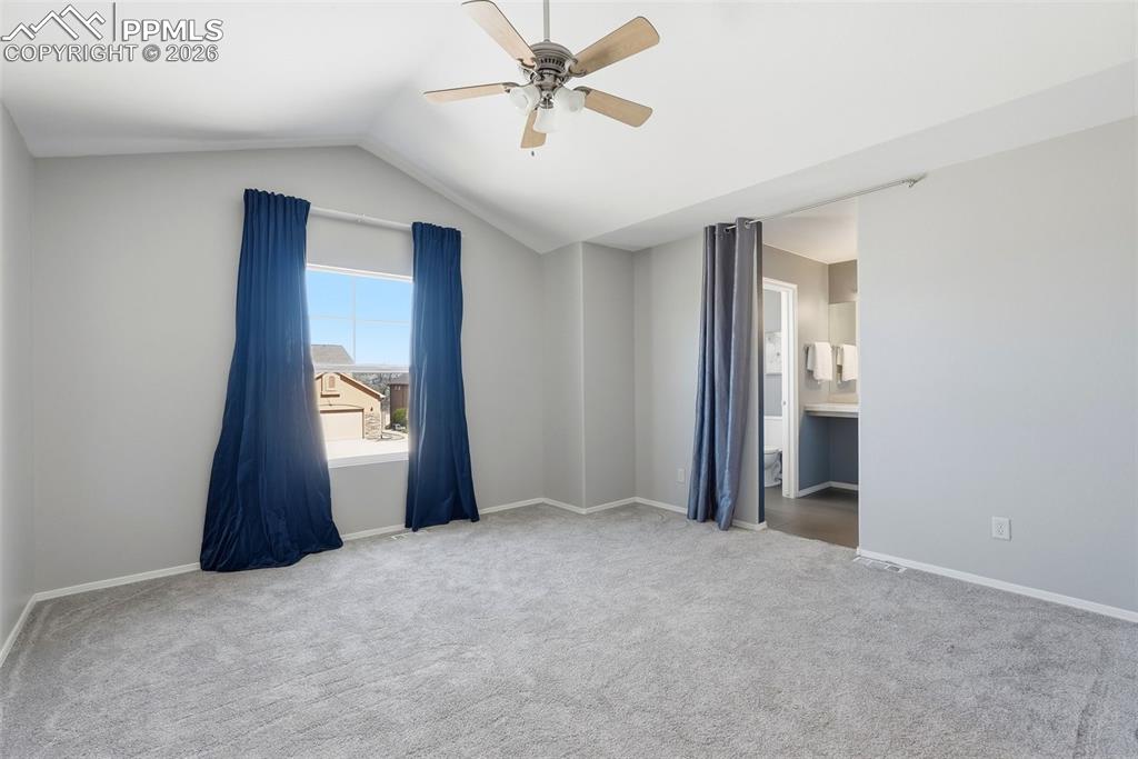 10744 Rhinestone Drive Colorado Springs, CO 80908 - Photo 33 of 50 an empty room with windows and closet