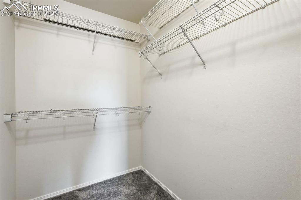 10744 Rhinestone Drive Colorado Springs, CO 80908 - Photo 35 of 50 a view of a room with racks on the wall