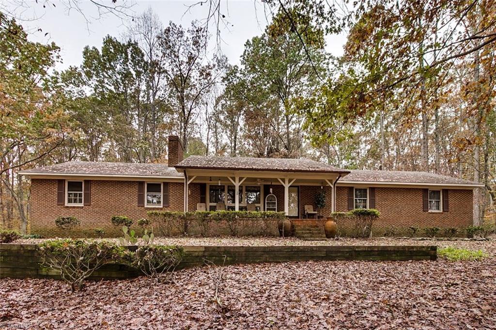 5902 Dehaven Road Pleasant Garden, NC 27313 - Photo 2 of 27 Come home to this cozy brick ranch on almost 2 acres