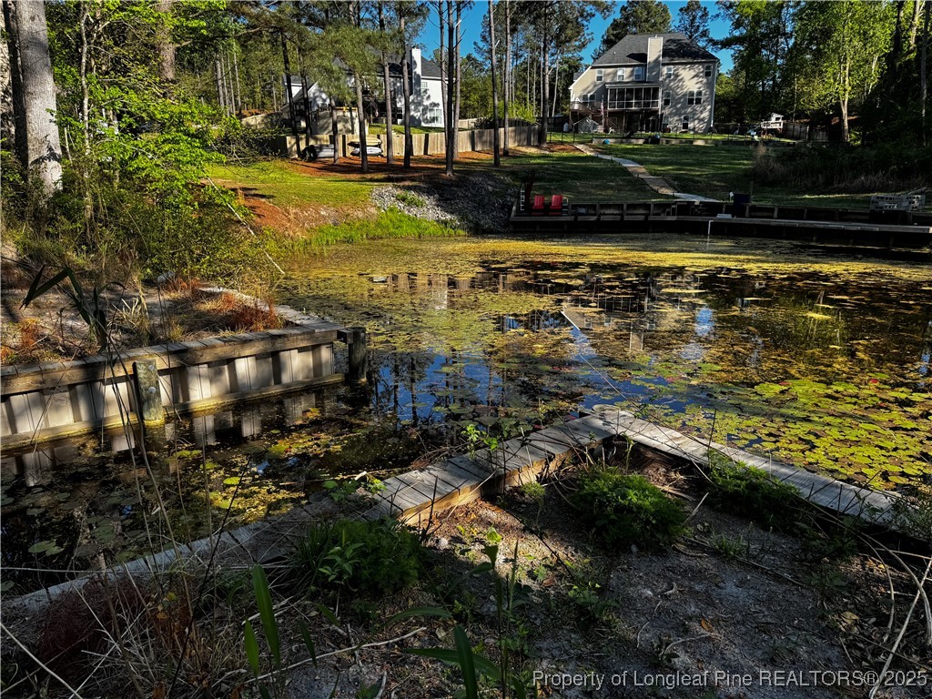 864 Vic Keith Road Sanford, NC 27332 - Photo 13 of 19 a view of a yard with an outdoor space