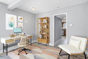 5021 Tall Pines Court Raleigh, NC 27609 - Photo 13 of 30 a view of a livingroom with workspace and a couch