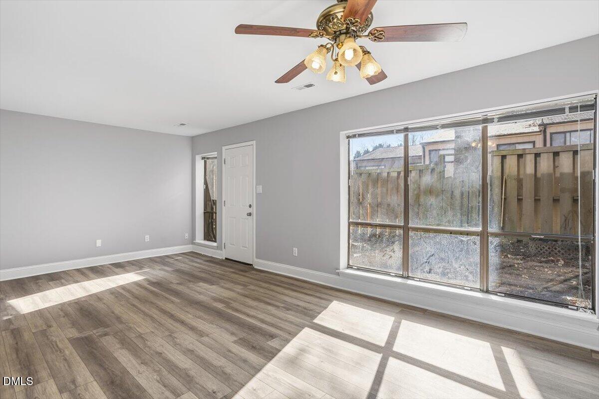 5021 Tall Pines Court Raleigh, NC 27609 - Photo 17 of 30 a view of an empty room with a window