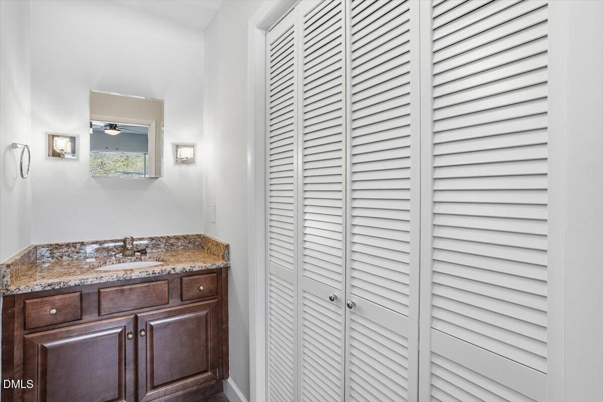 5021 Tall Pines Court Raleigh, NC 27609 - Photo 20 of 30 a stove top oven sitting inside of a kitchen