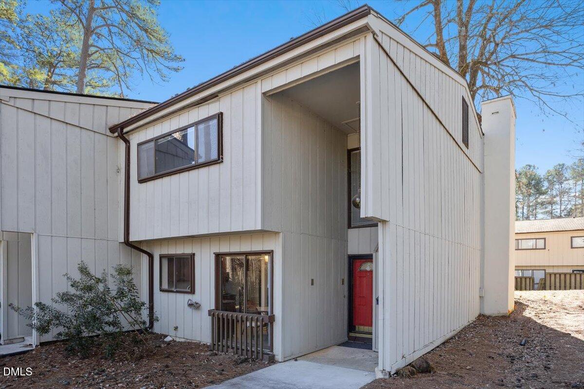 5021 Tall Pines Court Raleigh, NC 27609 - Photo 2 of 30 a front view of a house with garden