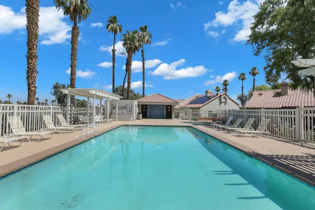 a view of a house with swimming pool