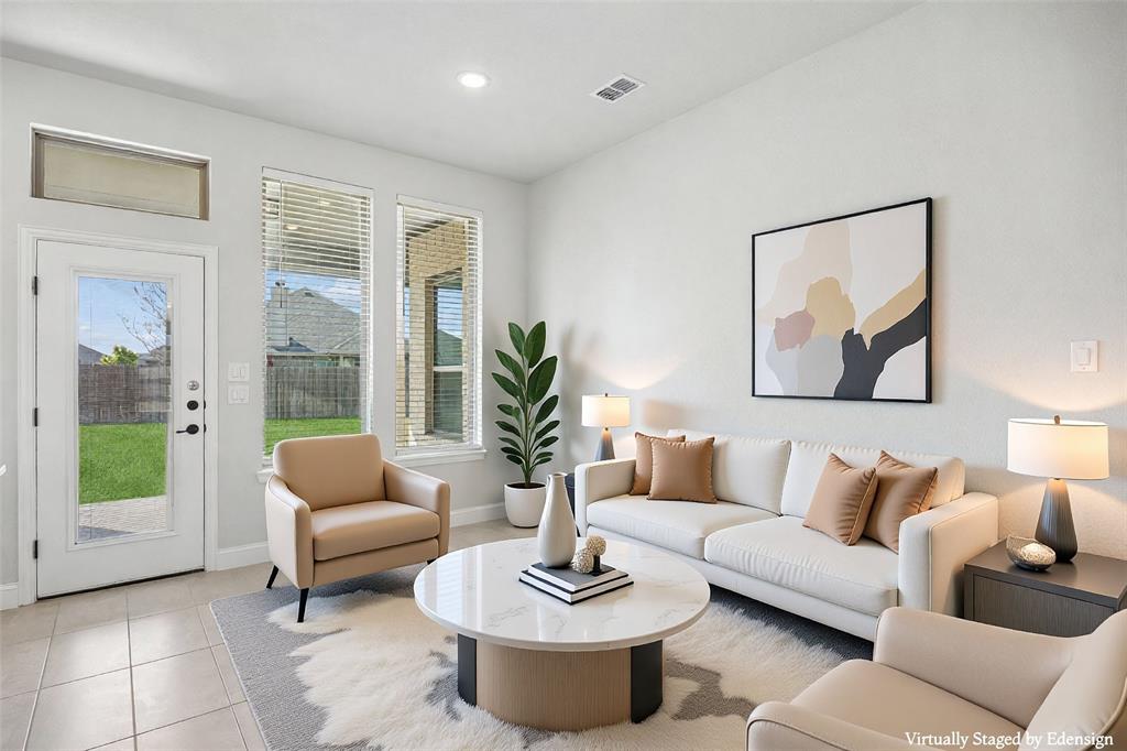 117 Joshua Tree Court Forney, TX 75126 - Photo 13 of 29 a living room with furniture and a potted plant