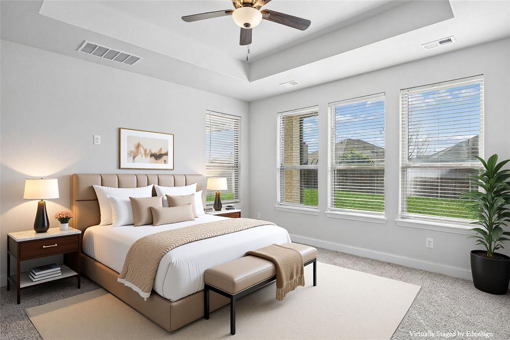 117 Joshua Tree Court Forney, TX 75126 - Photo 15 of 29 a bedroom with bed and a large window