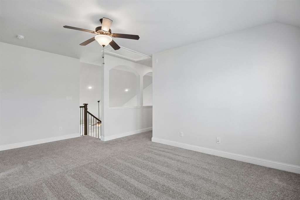 117 Joshua Tree Court Forney, TX 75126 - Photo 21 of 29 a view of empty room with ceiling fan