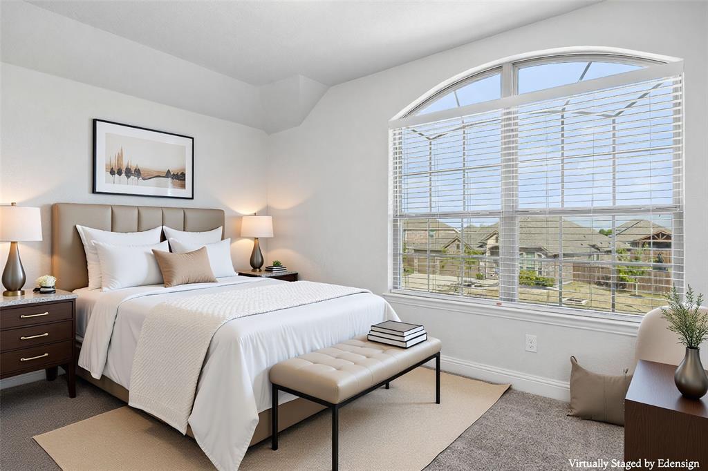 117 Joshua Tree Court Forney, TX 75126 - Photo 22 of 29 a bedroom with a bed and a large window