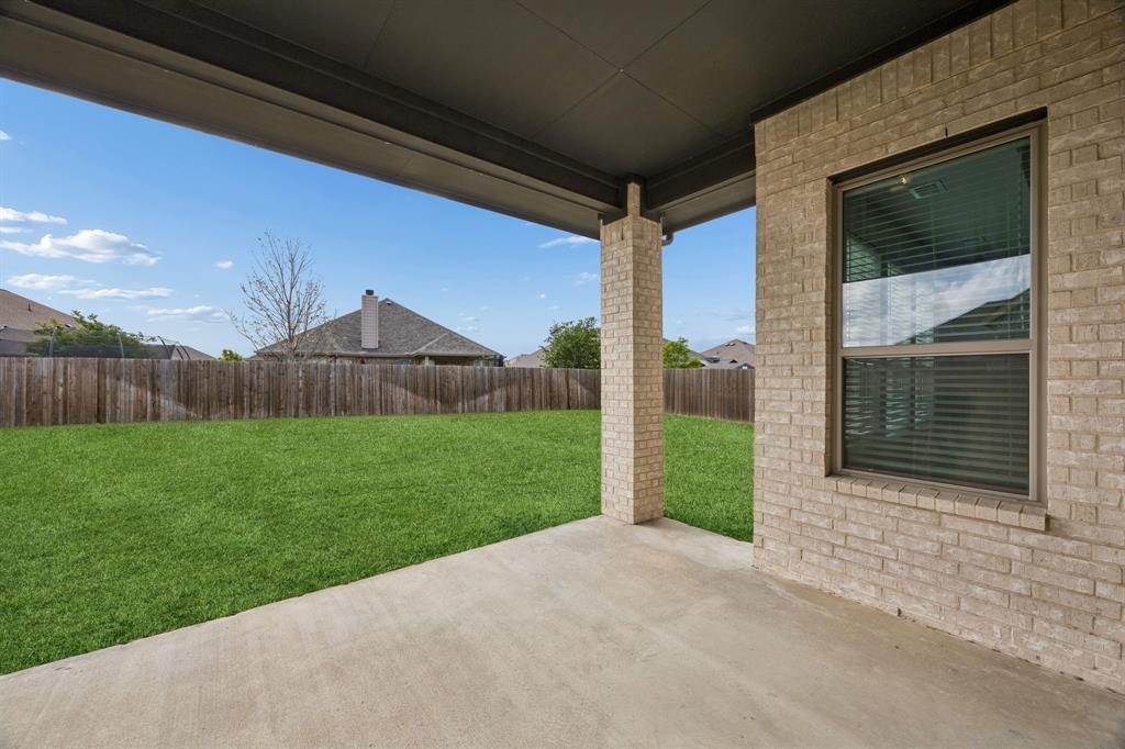 117 Joshua Tree Court Forney, TX 75126 - Photo 28 of 29 a house view with garden space