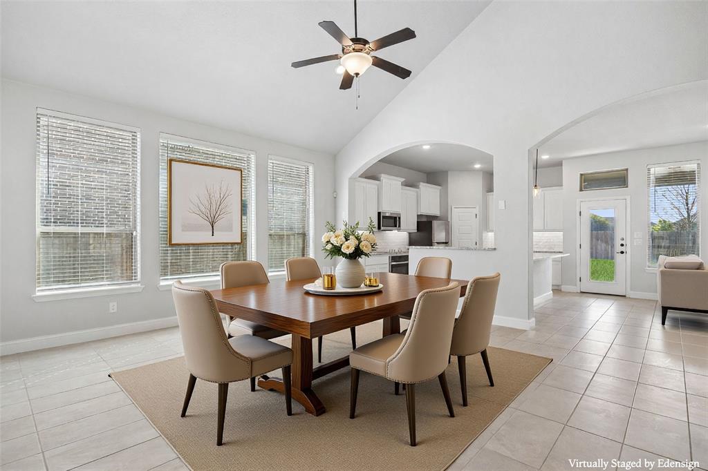 117 Joshua Tree Court Forney, TX 75126 - Photo 5 of 29 a view of a dining room with furniture and a large window