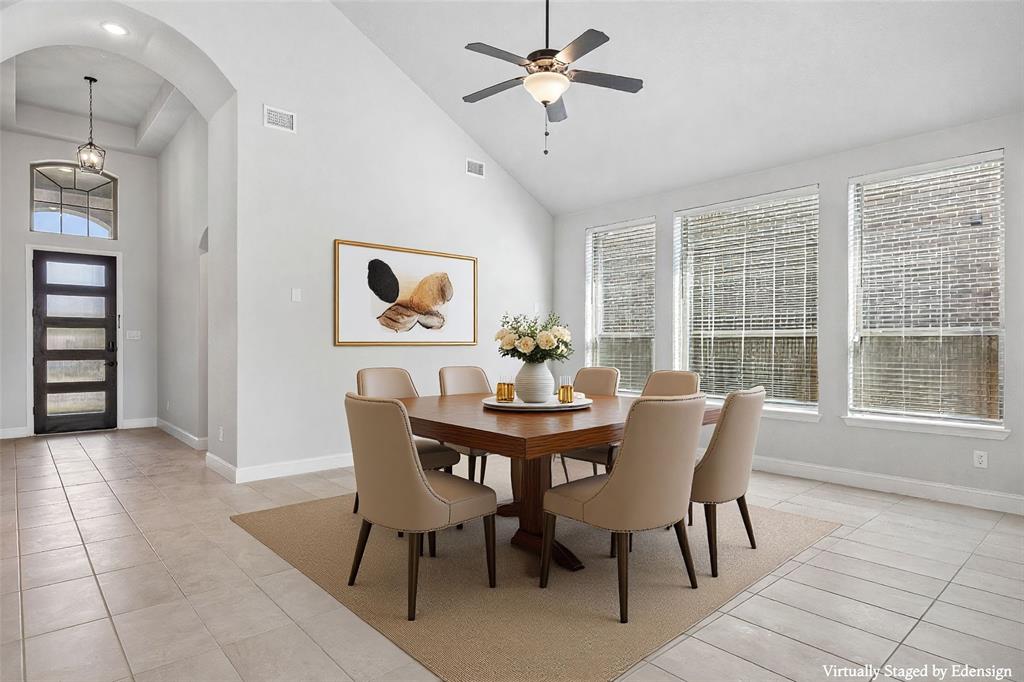 117 Joshua Tree Court Forney, TX 75126 - Photo 6 of 29 a view of a dining room with furniture and a large window