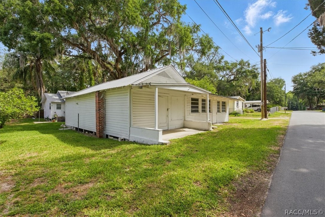 6 62nd Street Yankeetown, FL 34498 - Photo 33 of 55 a view of a house with a yard