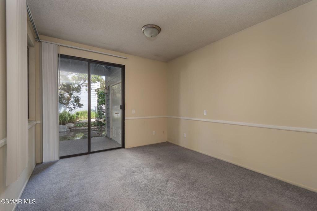 647 Arneill Road Camarillo, CA 93010 - Photo 11 of 27 a view of an empty room with glass door