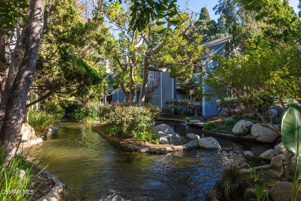 647 Arneill Road Camarillo, CA 93010 - Photo 25 of 27 a view of a garden with lawn chairs