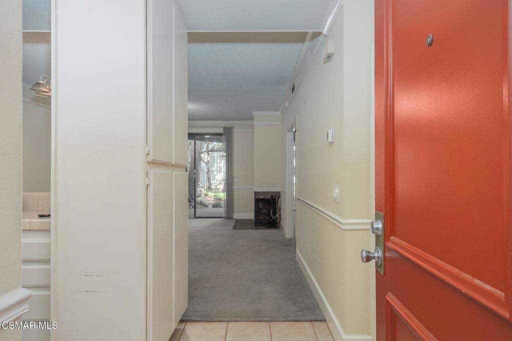 647 Arneill Road Camarillo, CA 93010 - Photo 3 of 27 a view of a hallway with a white walls