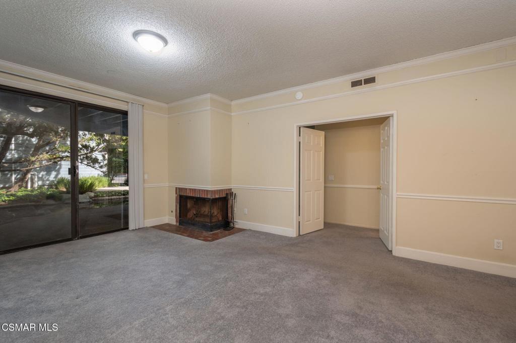 647 Arneill Road Camarillo, CA 93010 - Photo 6 of 27 an empty room with windows