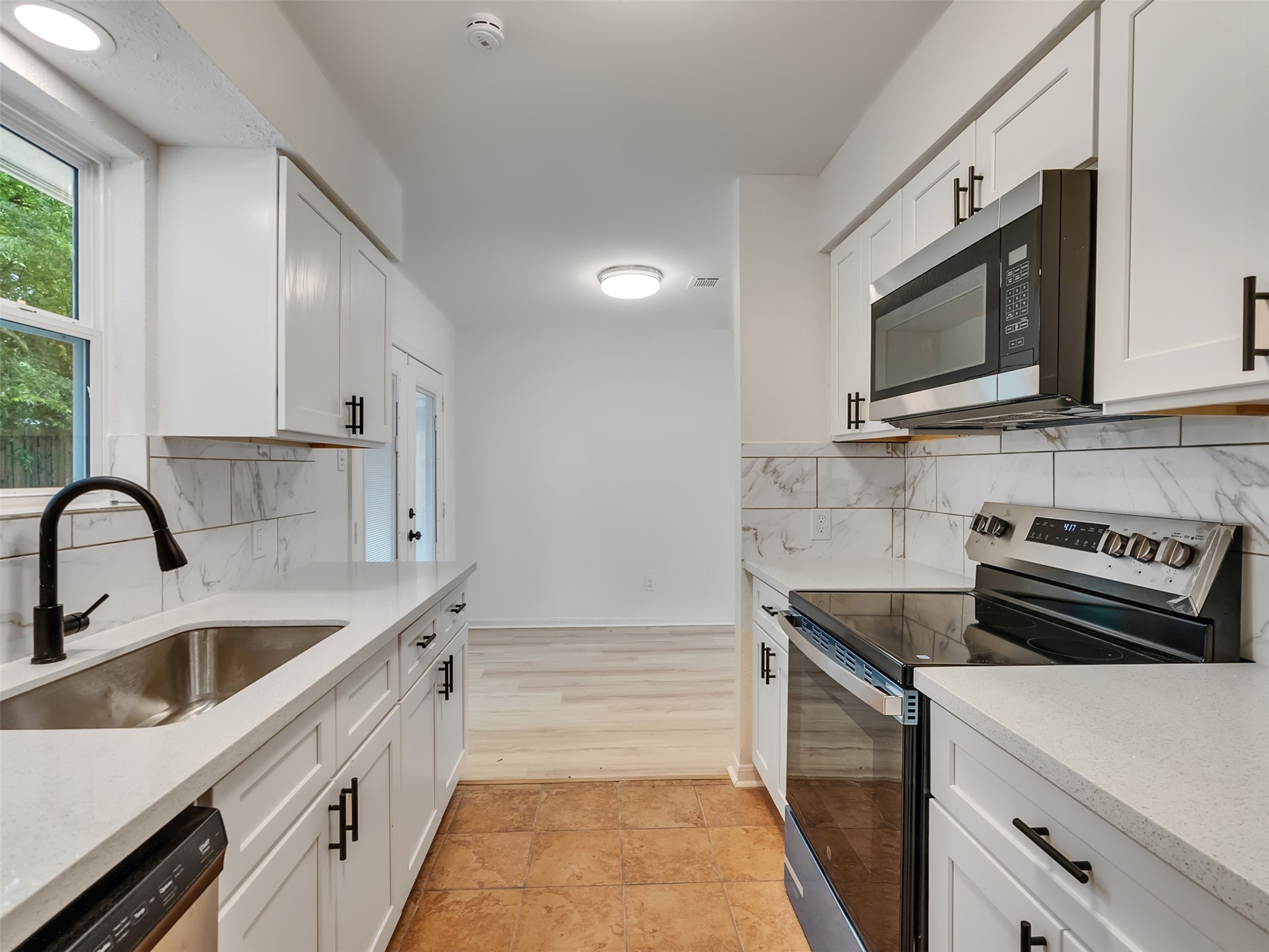 3915 Brumbelow Street Rosenberg, TX 77471 - Photo 4 of 25 Another View of the Kitchen