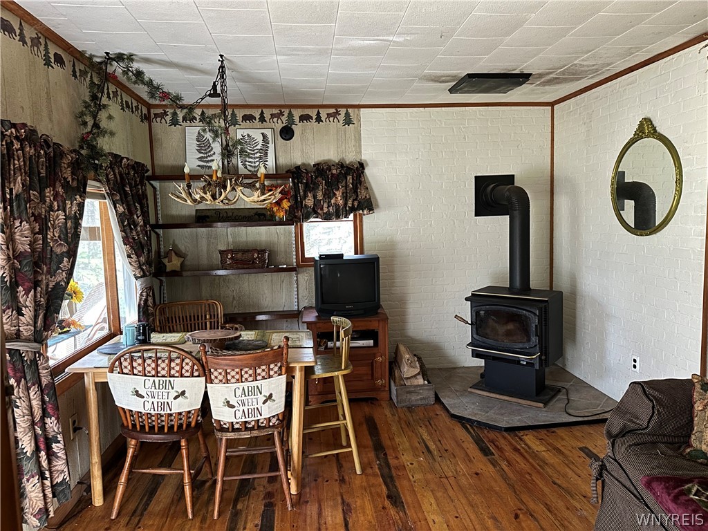 3631 Pine Ridge Road Clarksville, NY 14727 - Photo 14 of 31 cozy fireplace/living/dining area