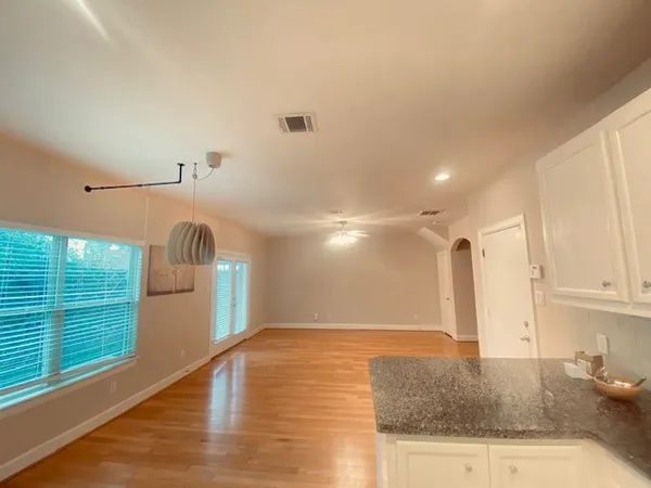 a view of a kitchen with a sink and dishwasher