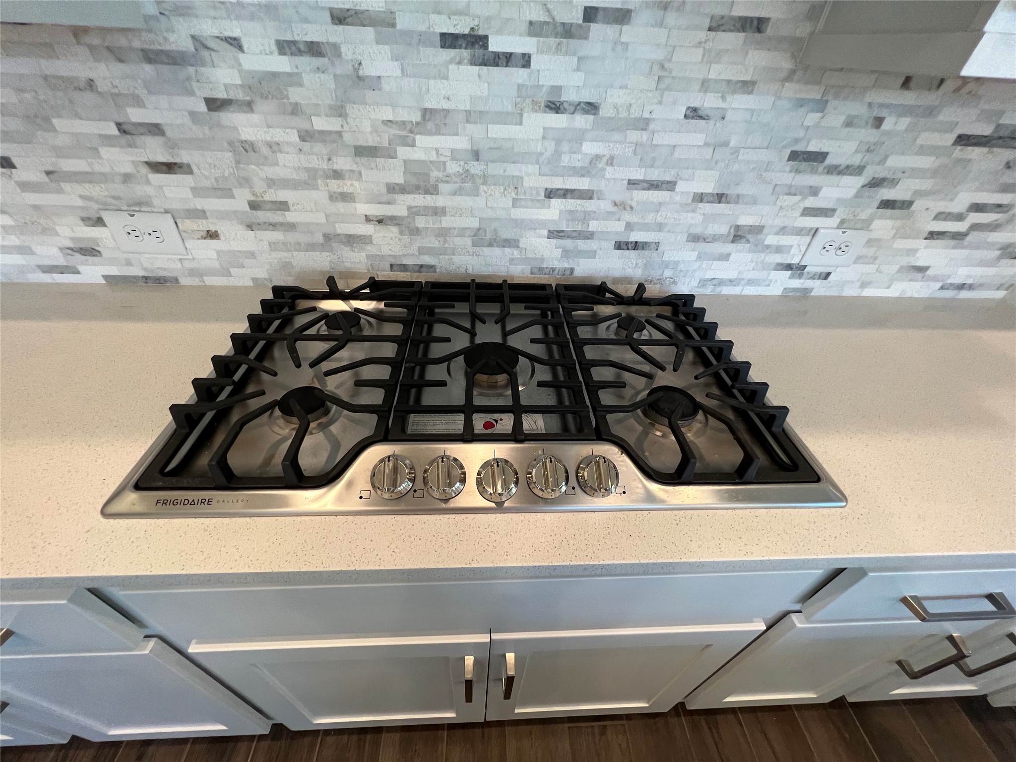 547 Kingston Lane Conroe, TX 77384 - Photo 15 of 50 a close up of a stove top oven sitting on a counter