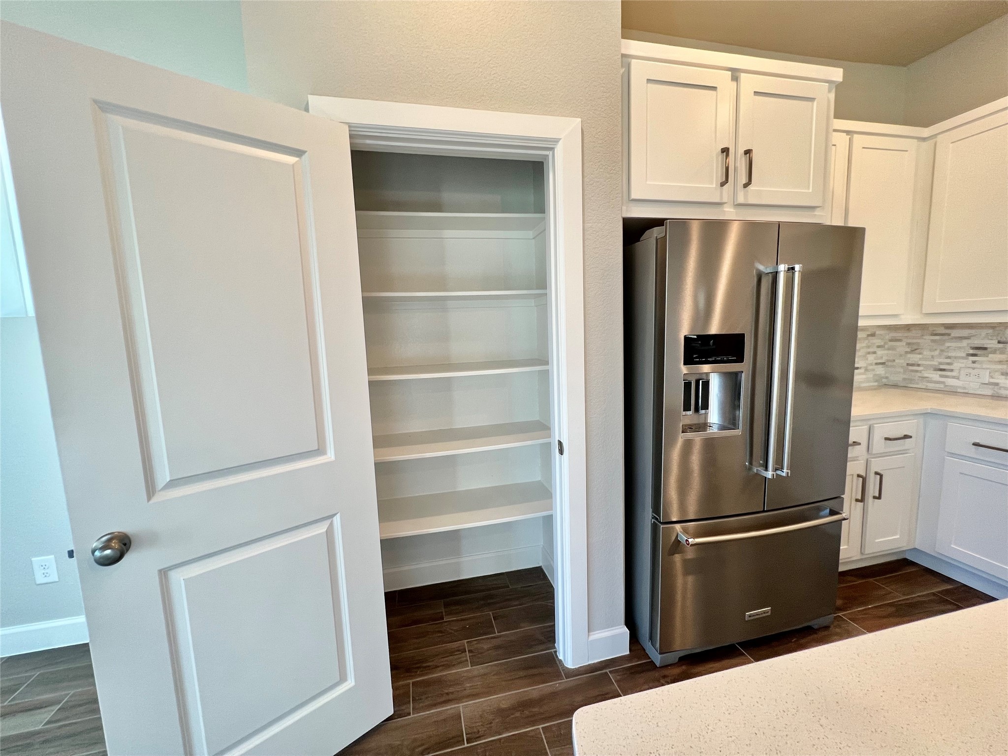 547 Kingston Lane Conroe, TX 77384 - Photo 17 of 50 a refrigerator freezer sitting inside of a kitchen