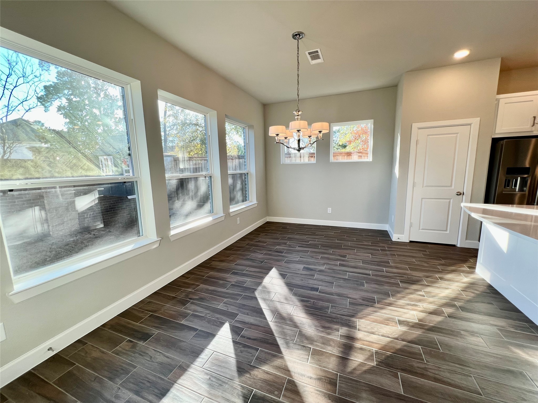 547 Kingston Lane Conroe, TX 77384 - Photo 18 of 50 a view of a living room and window