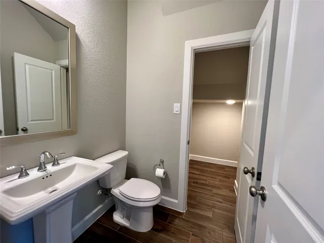 a view of a hallway with windows